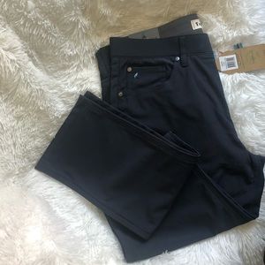 Slim fit Stretch, performance tech pants.